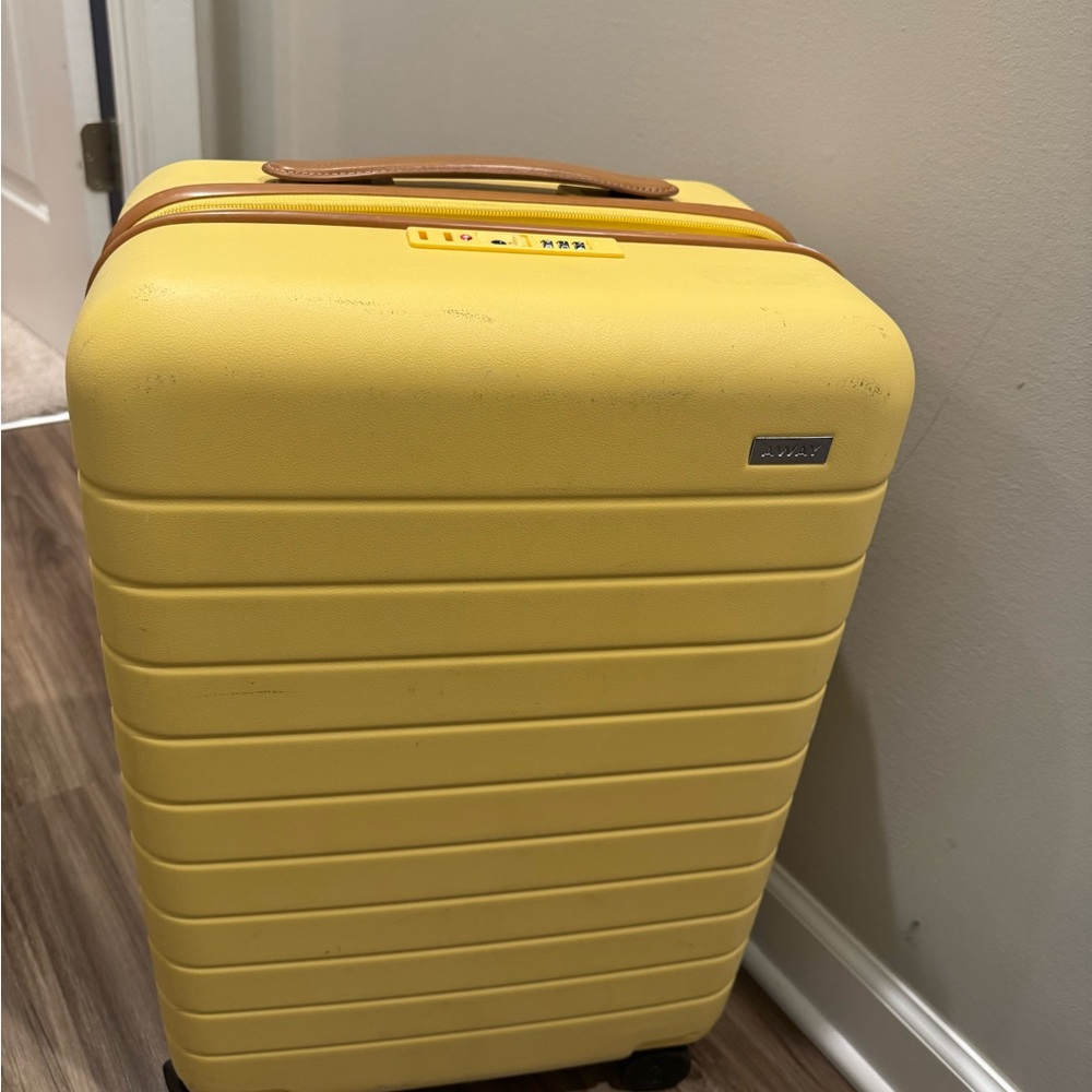 Away Luggage Expandable Bigger Carry-On in Yellow